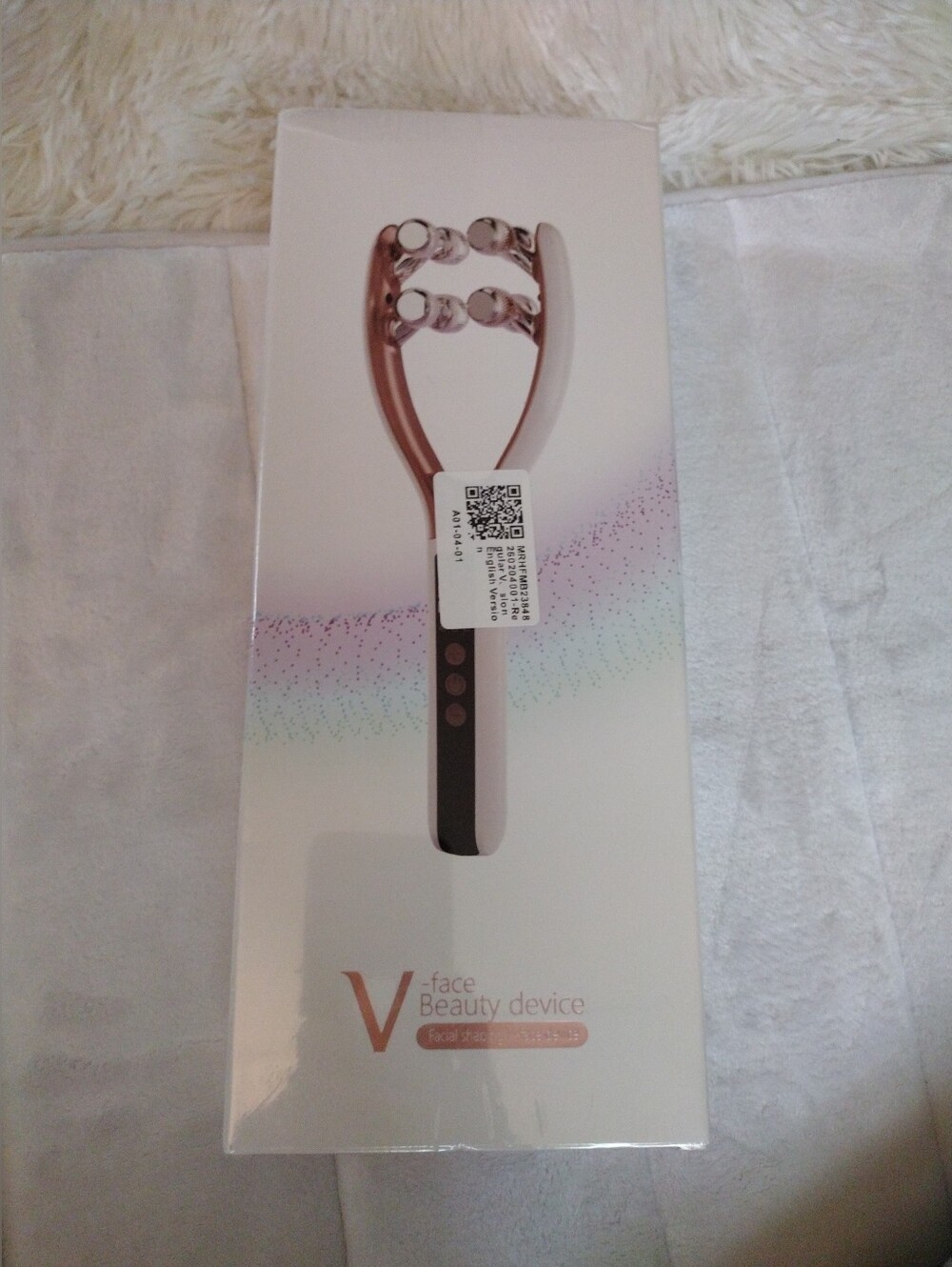 V-face Beauty Device Roller in Rose Gold and White